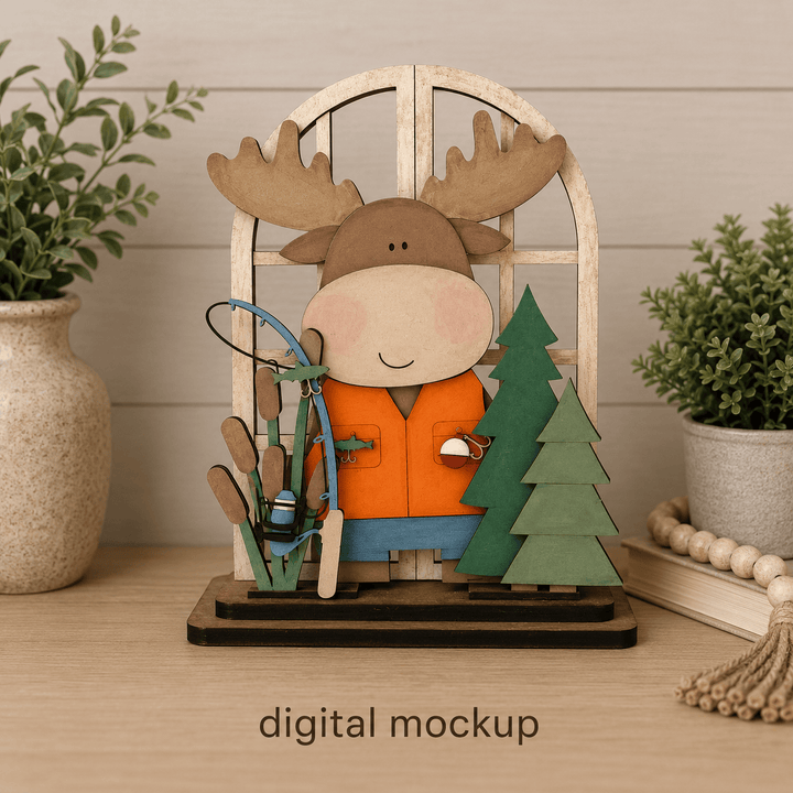 Fisherman moose with fishing pole and forest trees assembled in the WallCutz interchangeable window kit