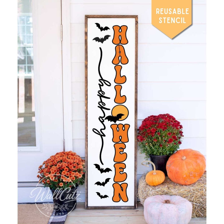 Reusable Happy Halloween mylar porch stencil shown next to finished porch sign