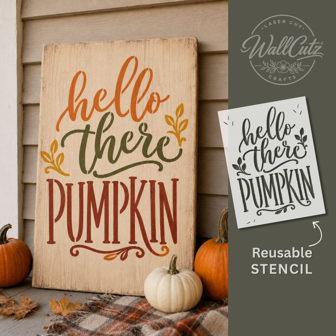Hello There Pumpkin reusable fall stencil painted in autumn colors on a round wood sign