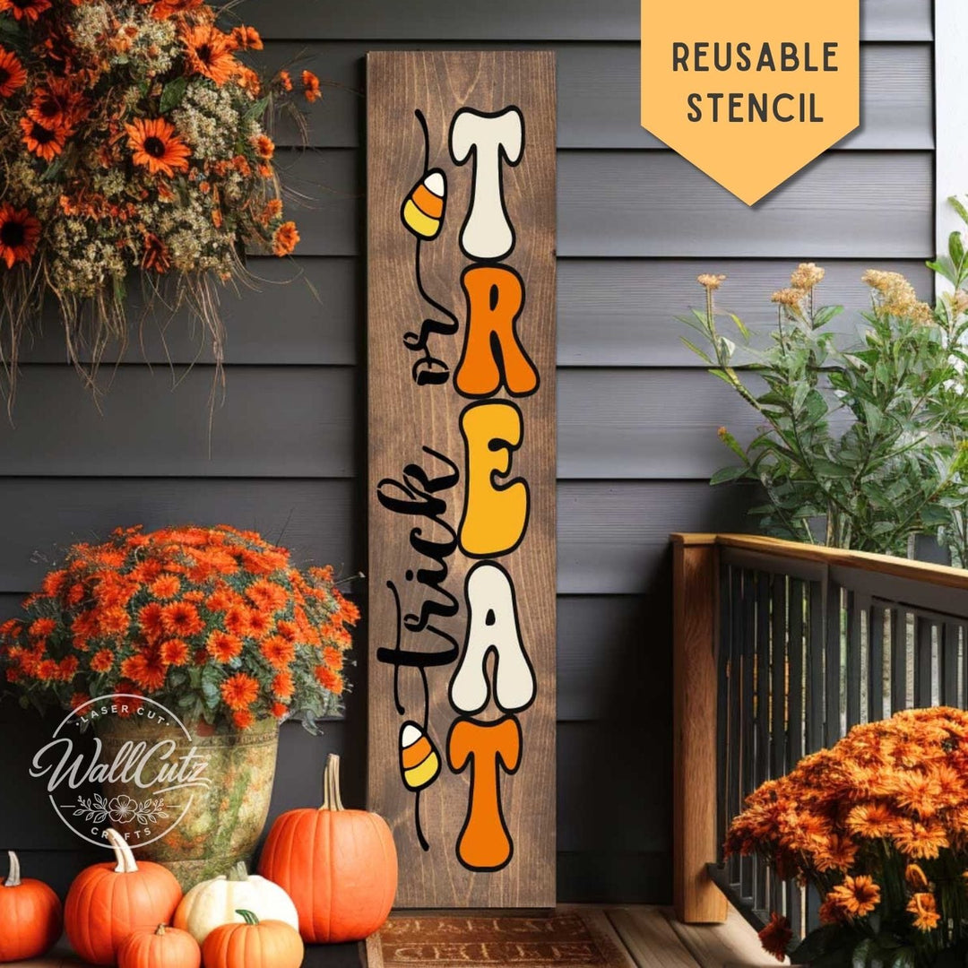 Trick or Treat candy corn porch stencil shown on a painted wood porch leaner sign – WallCutz